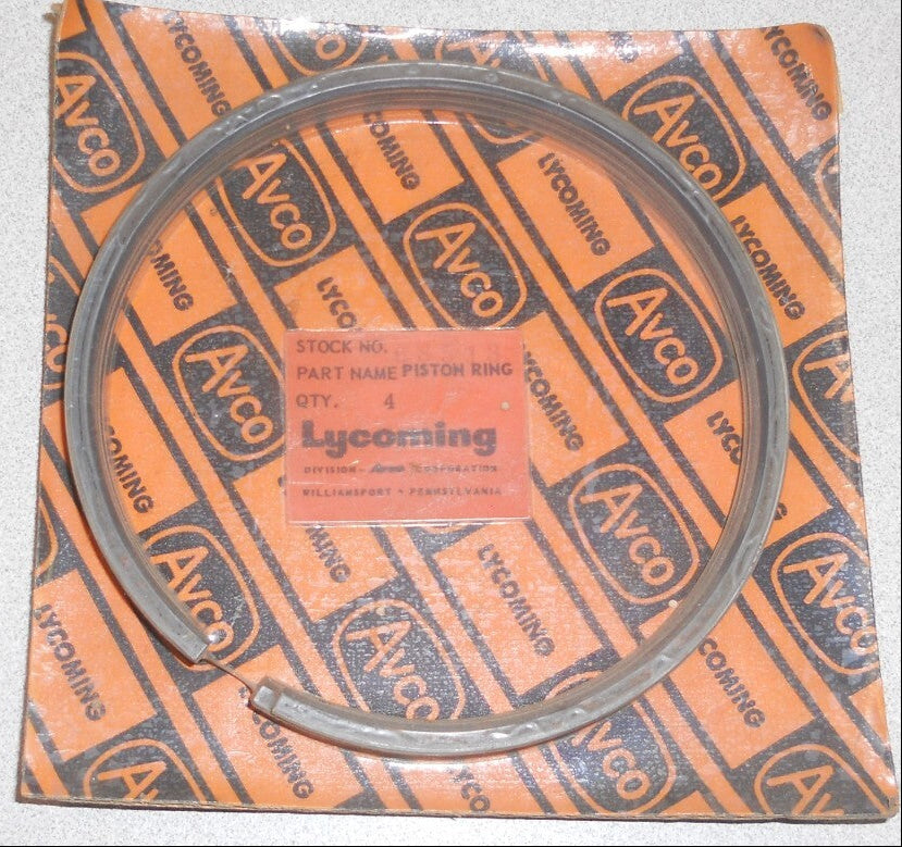 Four Lycoming piston rings, p/n 68513, in blue Avco packaging
