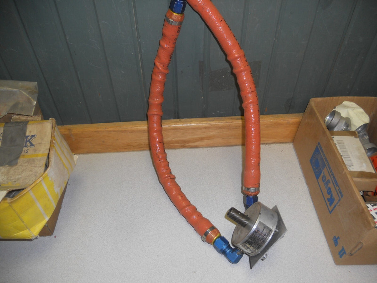 Oil filter remote adapter with hoses