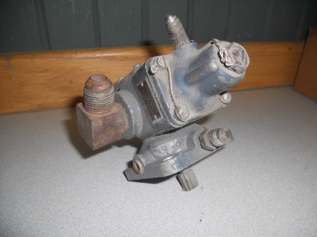 Fuel pump housing showing wear and surface rust