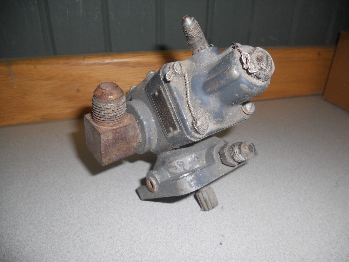 Fuel pump housing showing wear and surface rust