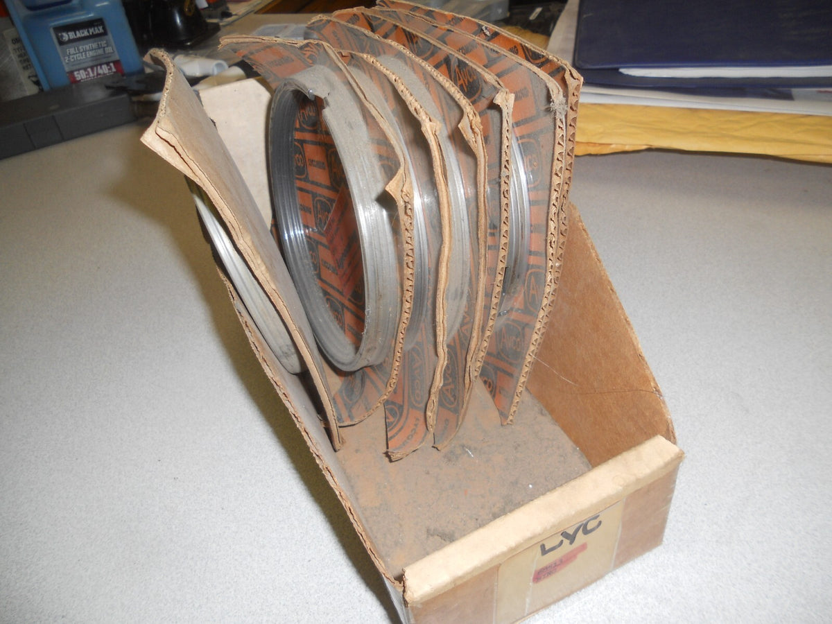 Silver piston rings in rubber-lined box